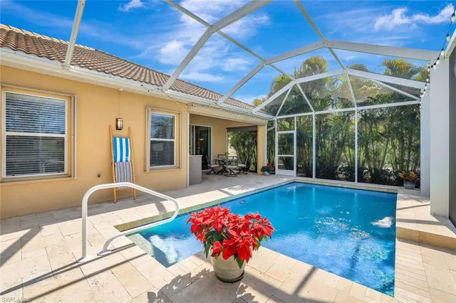 a outdoor space with swimming pool and furniture