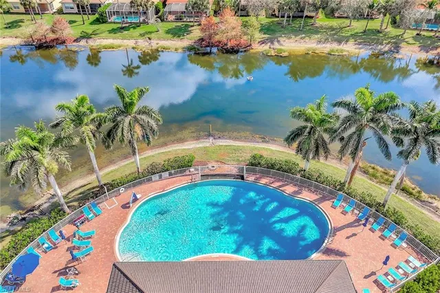 an aerial view of a house with a swimming pool