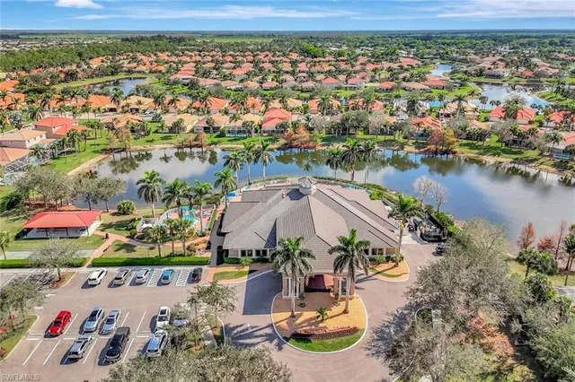 an aerial view of a house with a ocean view