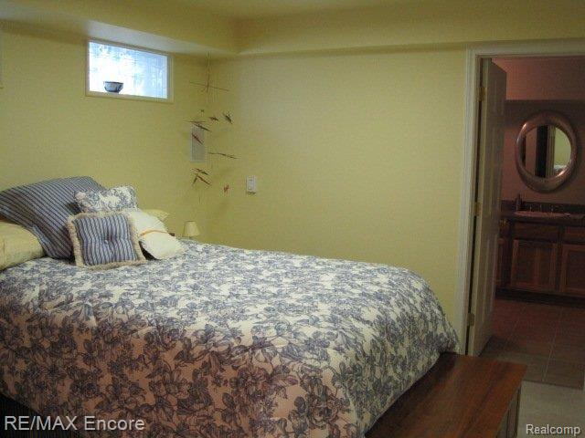 828 Snowmass Drive Rochester, MI 48309 - Photo 19 of 24 Basement Bedroom