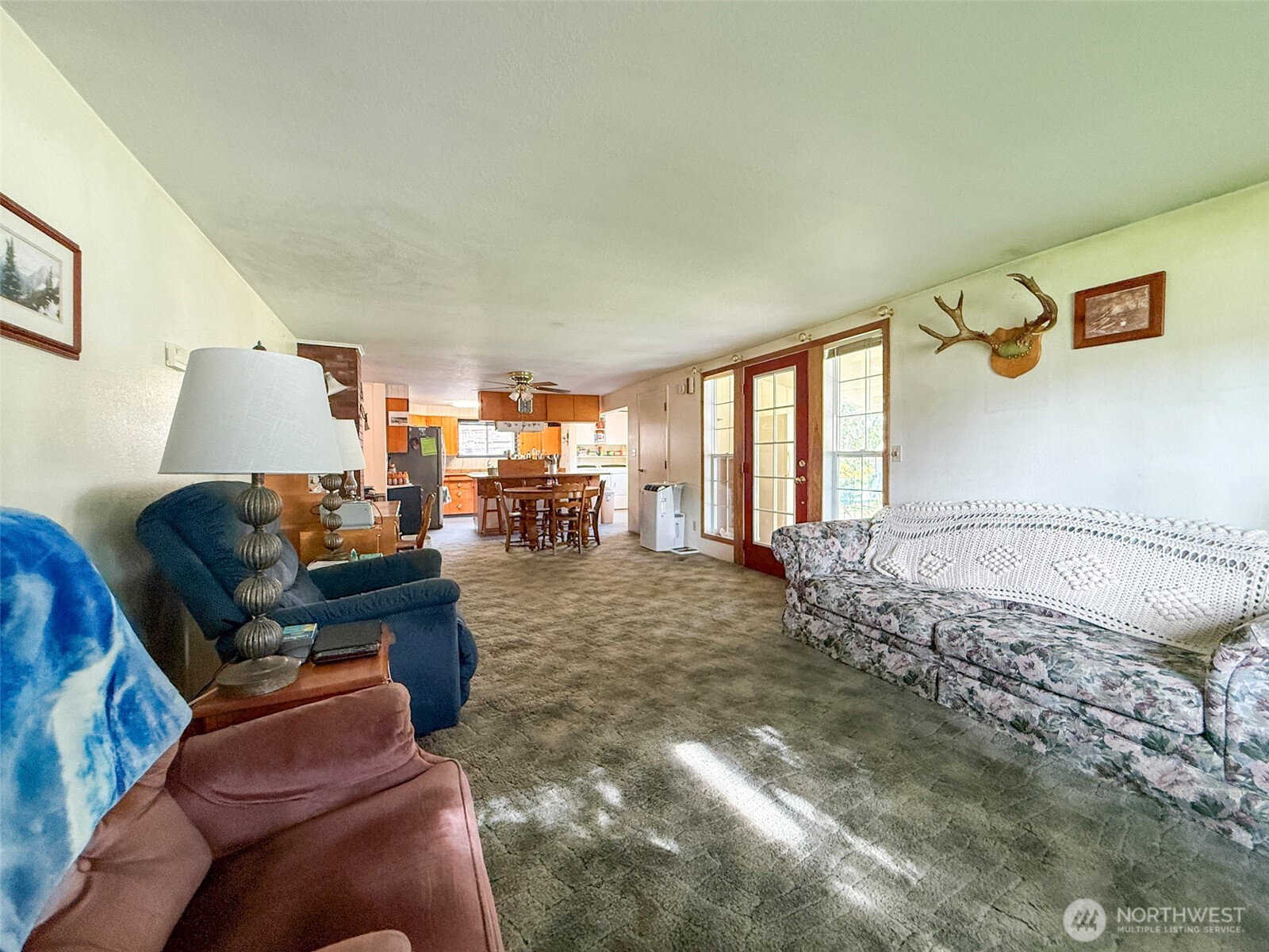 518 Bridge Street Twisp, WA 98856 - Photo 10 of 40 a living room with furniture and a large window