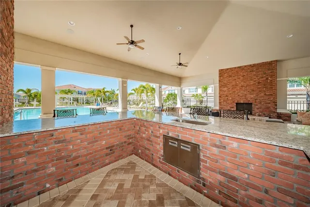a living room with fireplace furniture and a fireplace