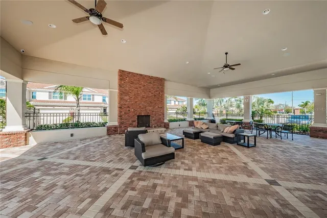 a view of a swimming pool with a patio