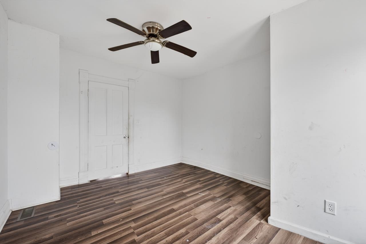 922 Lincoln Avenue Rochelle, IL 61068 - Photo 21 of 46 a view of a hallway with wooden floor