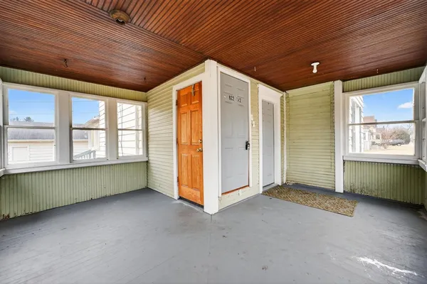a spacious bathroom with a sink a mirror and a shower