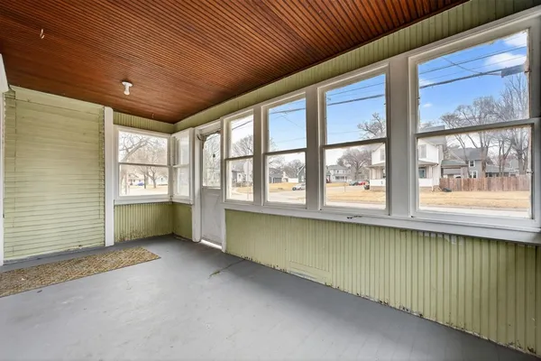 an empty room with windows