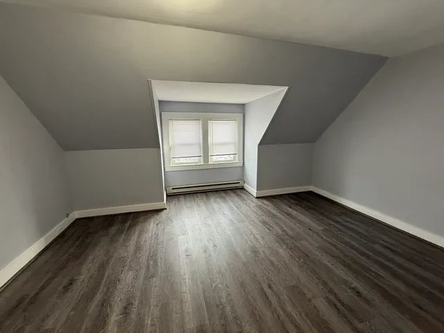 a view of hallway with windows