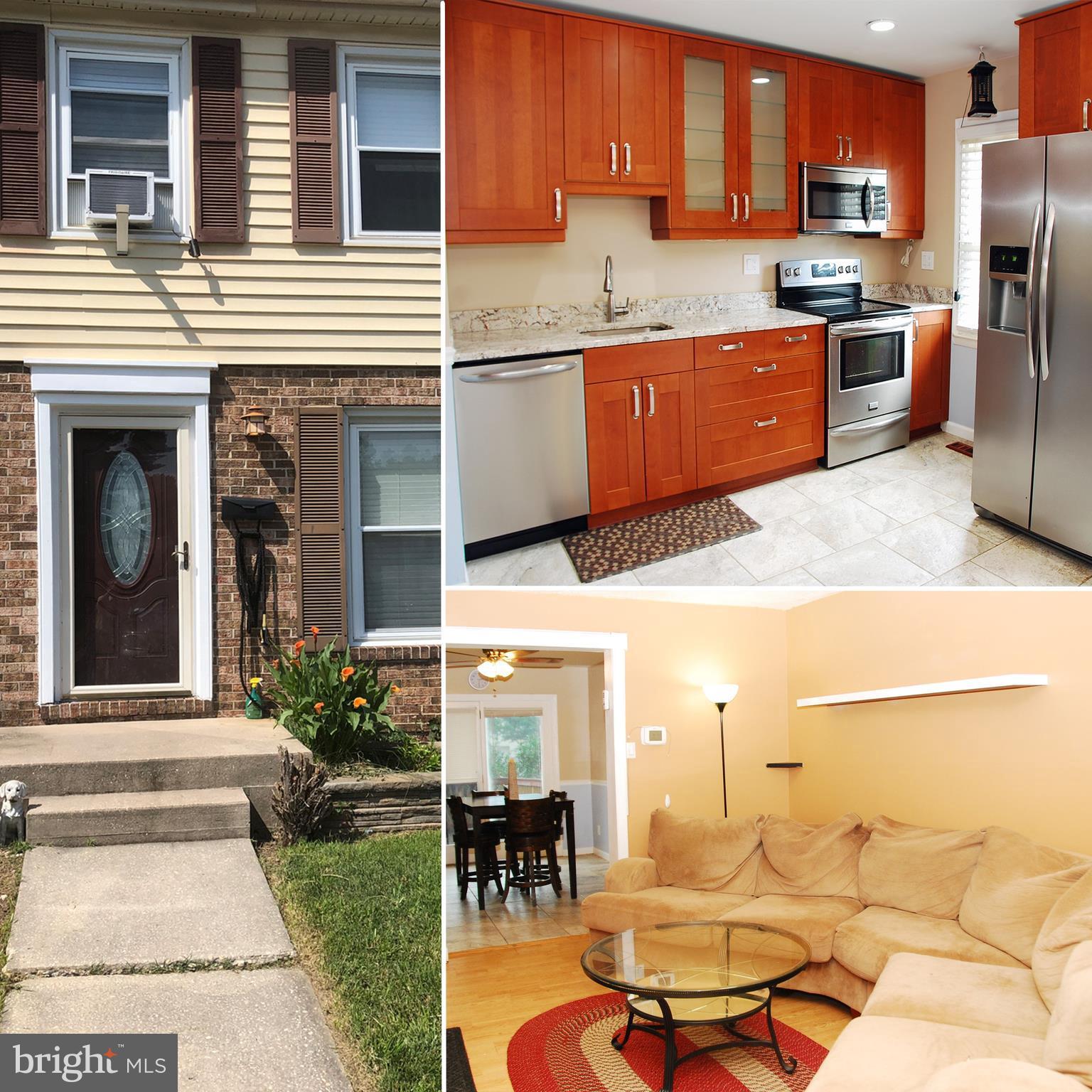 a kitchen with stainless steel appliances kitchen island granite countertop a refrigerator and stove
