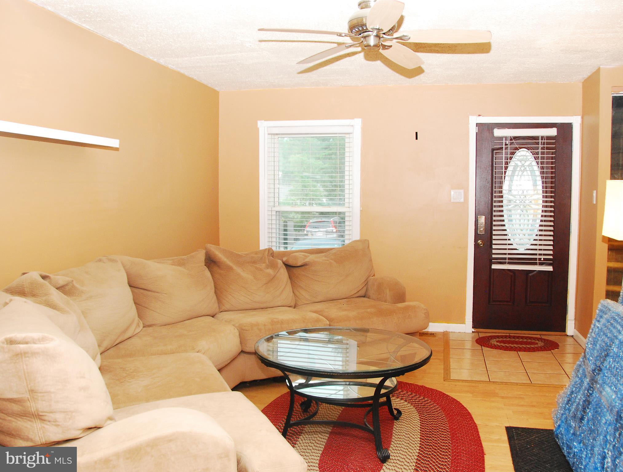 10 Congaree Court Baltimore, MD 21236 - Photo 2 of 22 a living room with furniture and a window