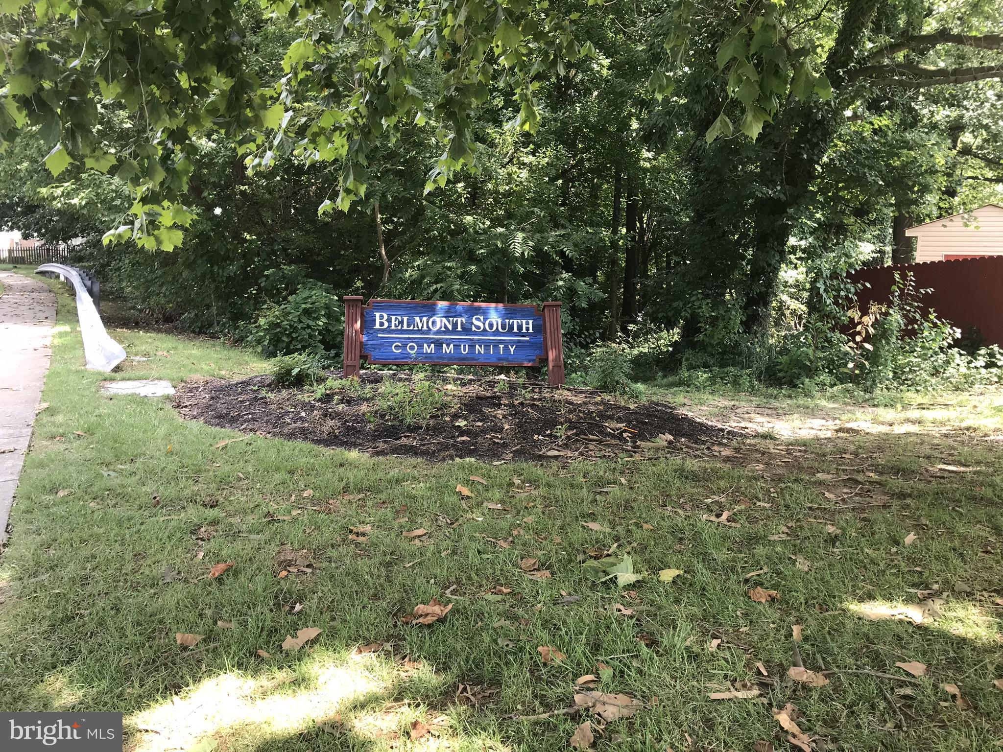 10 Congaree Court Baltimore, MD 21236 - Photo 21 of 22 a sign that is sitting in the middle of forest