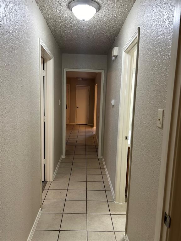 4508 Compass Court Fort Worth, TX 76135 - Photo 11 of 21 a view of a hallway