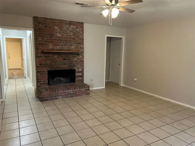 a living room with a fireplace