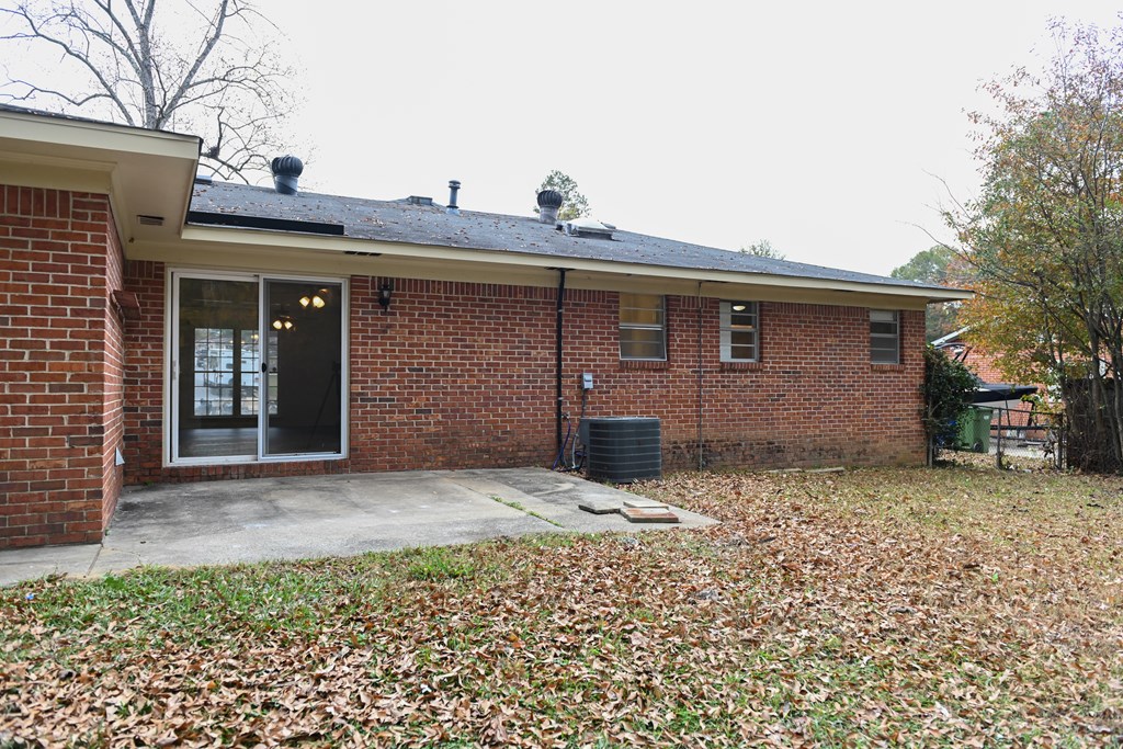 6421 Lemans Lane Columbus, GA 31909 - Photo 6 of 32 front view of a house with a yard