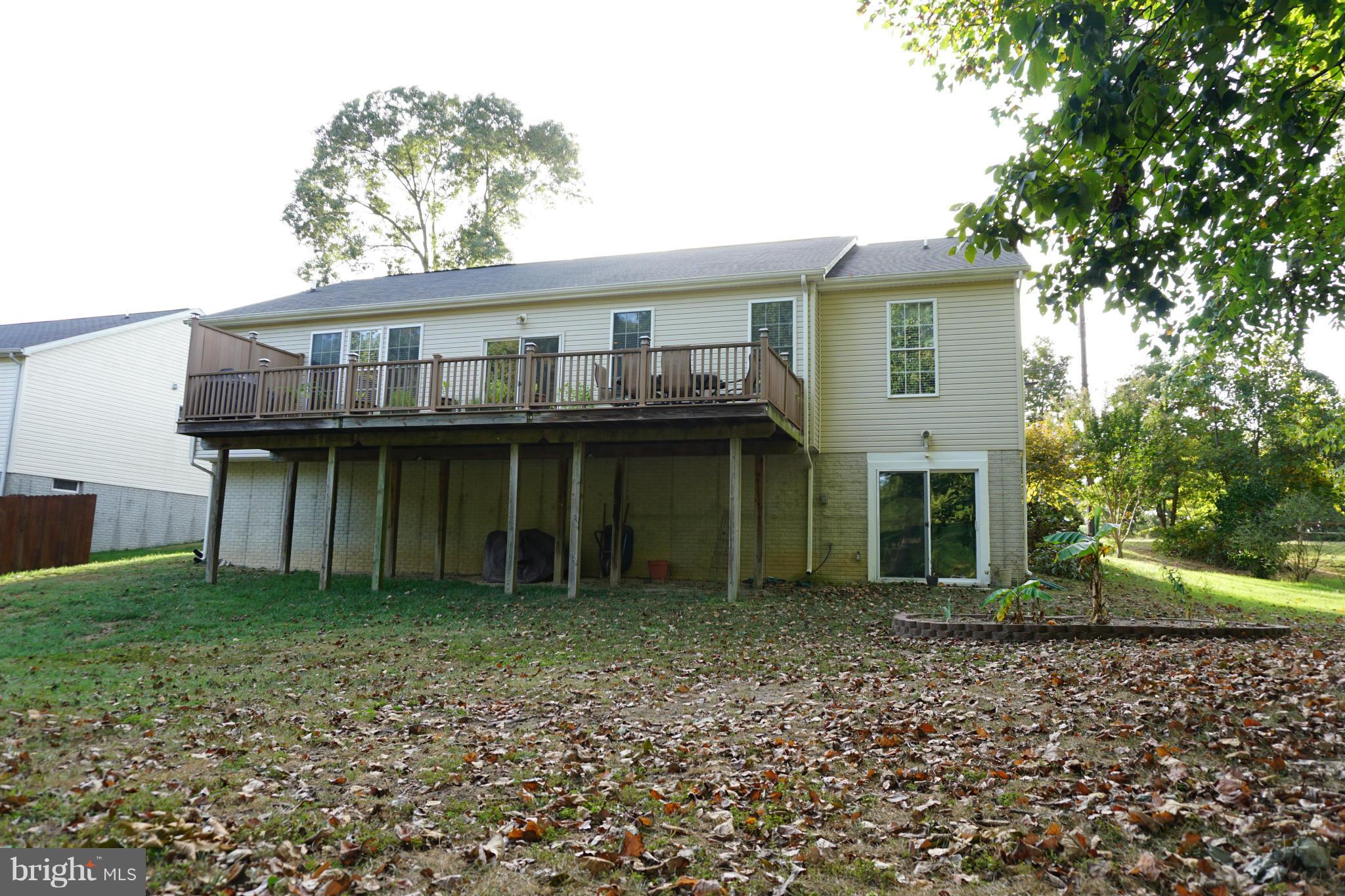 11202 Rawhide Road Lusby, MD 20657 - Photo 22 of 24 a house with a outdoor space