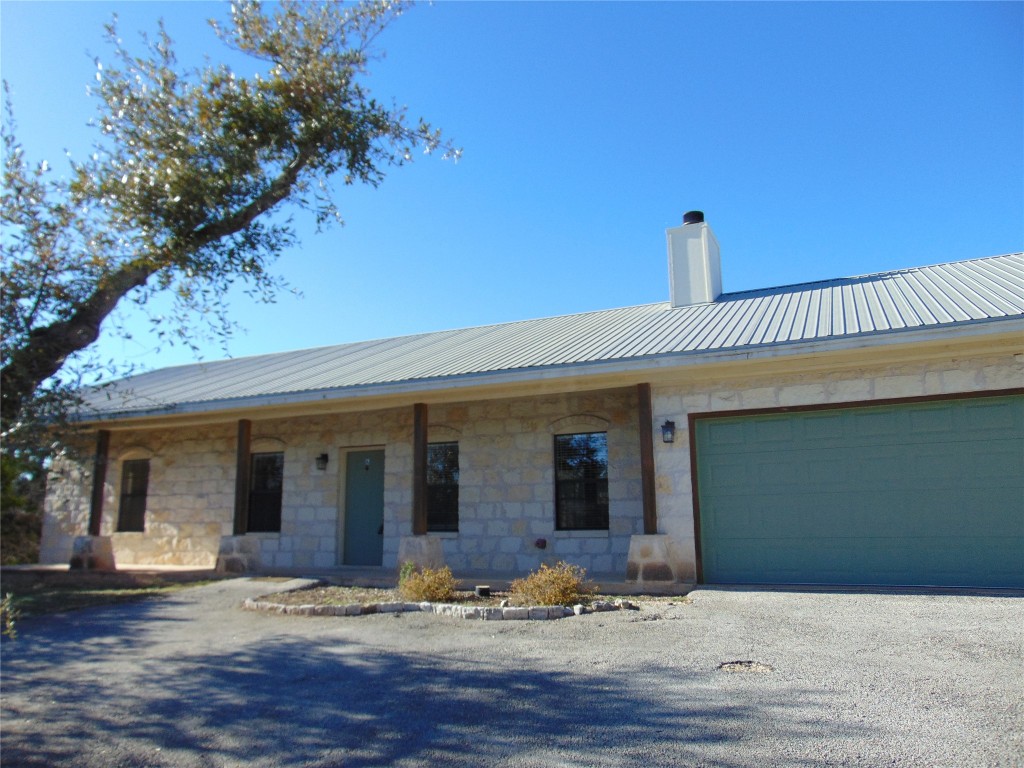 a front view of a house with yard