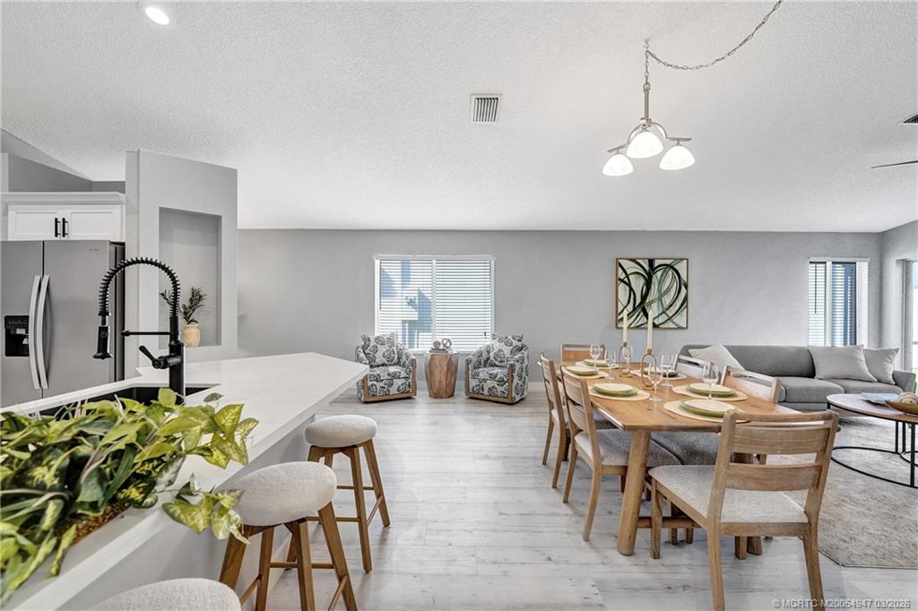 4365 Pine Ridge Court Weston, FL 33331 - Photo 11 of 63 a view of a dining room with furniture