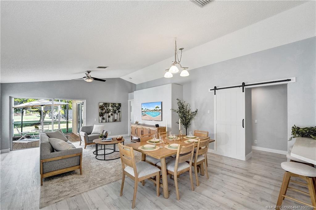4365 Pine Ridge Court Weston, FL 33331 - Photo 15 of 63 a view of a dining room with furniture and wooden floor