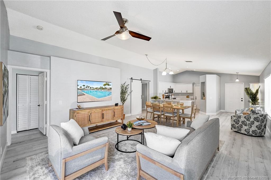 4365 Pine Ridge Court Weston, FL 33331 - Photo 24 of 63 a living room with furniture and kitchen view