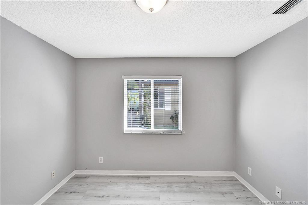 4365 Pine Ridge Court Weston, FL 33331 - Photo 37 of 63 a view of a room that has a window in it