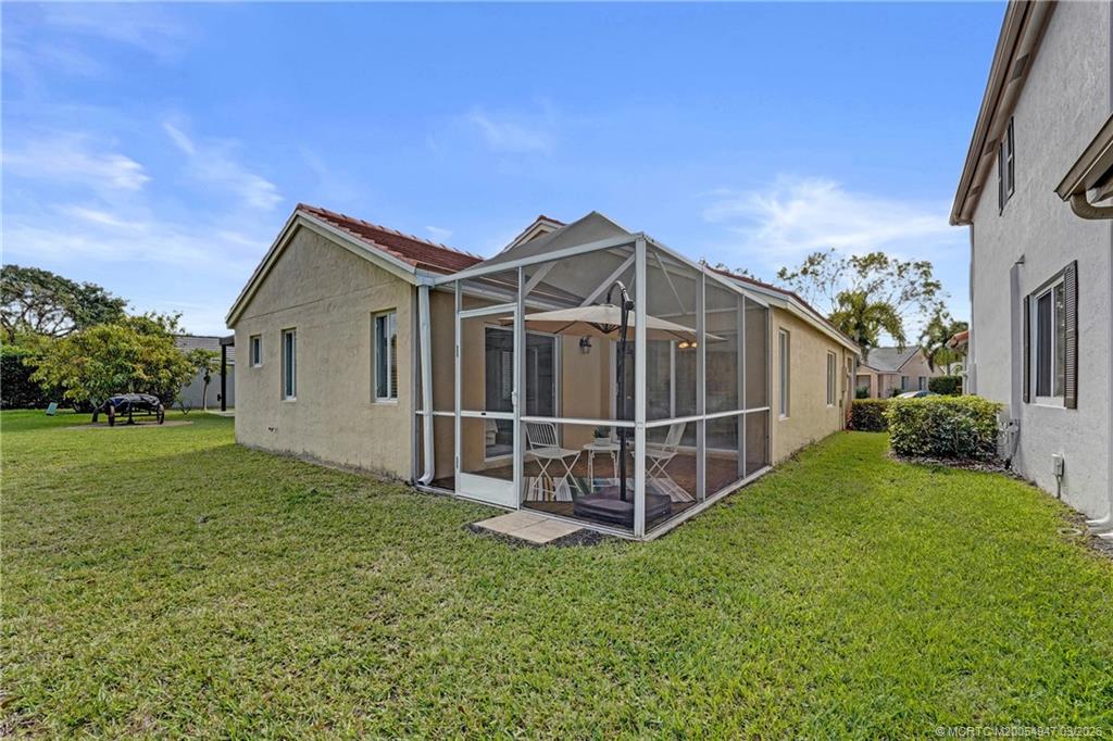 4365 Pine Ridge Court Weston, FL 33331 - Photo 50 of 63 a view of a house with a yard