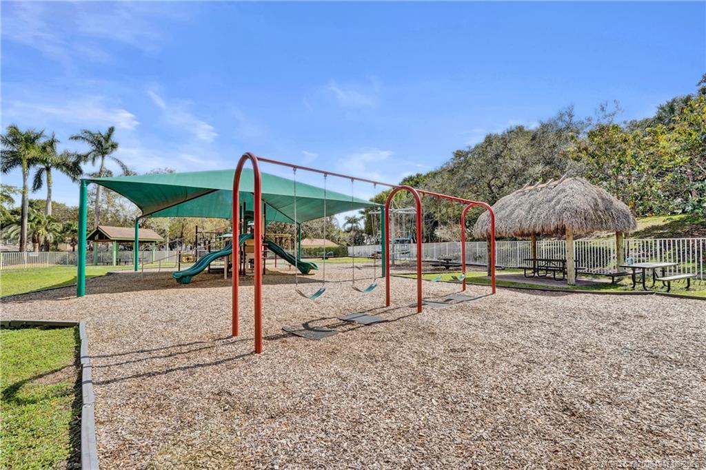 4365 Pine Ridge Court Weston, FL 33331 - Photo 59 of 63 a view of a house with a yard and sitting area