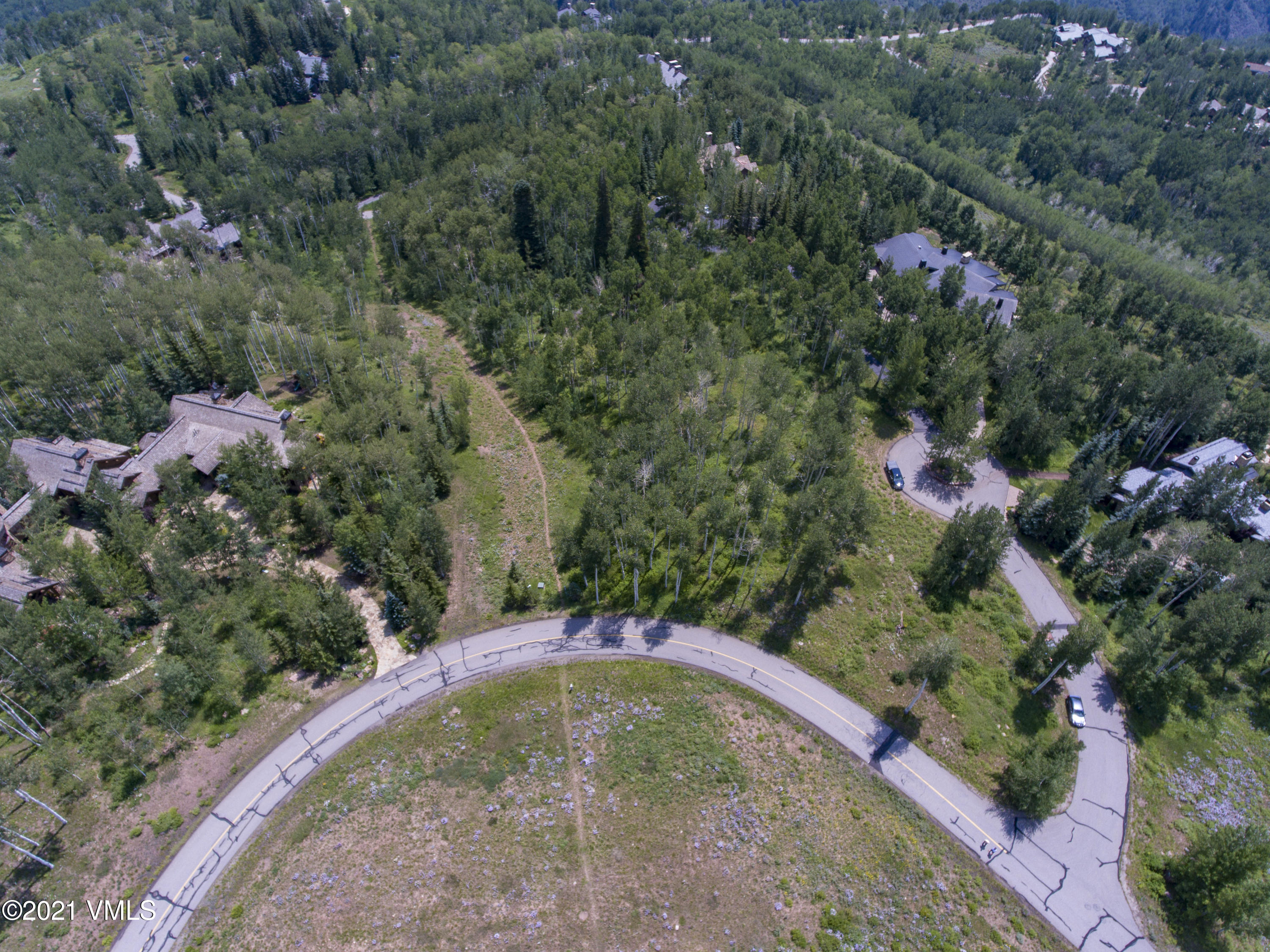 294 Shooting Star Avon, CO 81620 - Photo 14 of 23 an aerial view of a house with a yard statue
