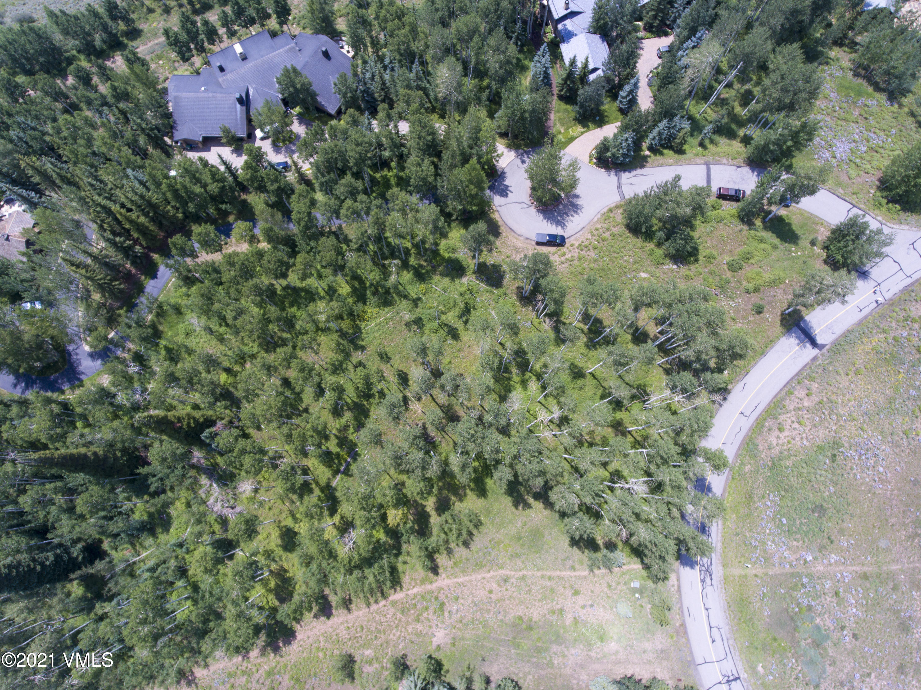 294 Shooting Star Avon, CO 81620 - Photo 18 of 23 a view of a house with a yard