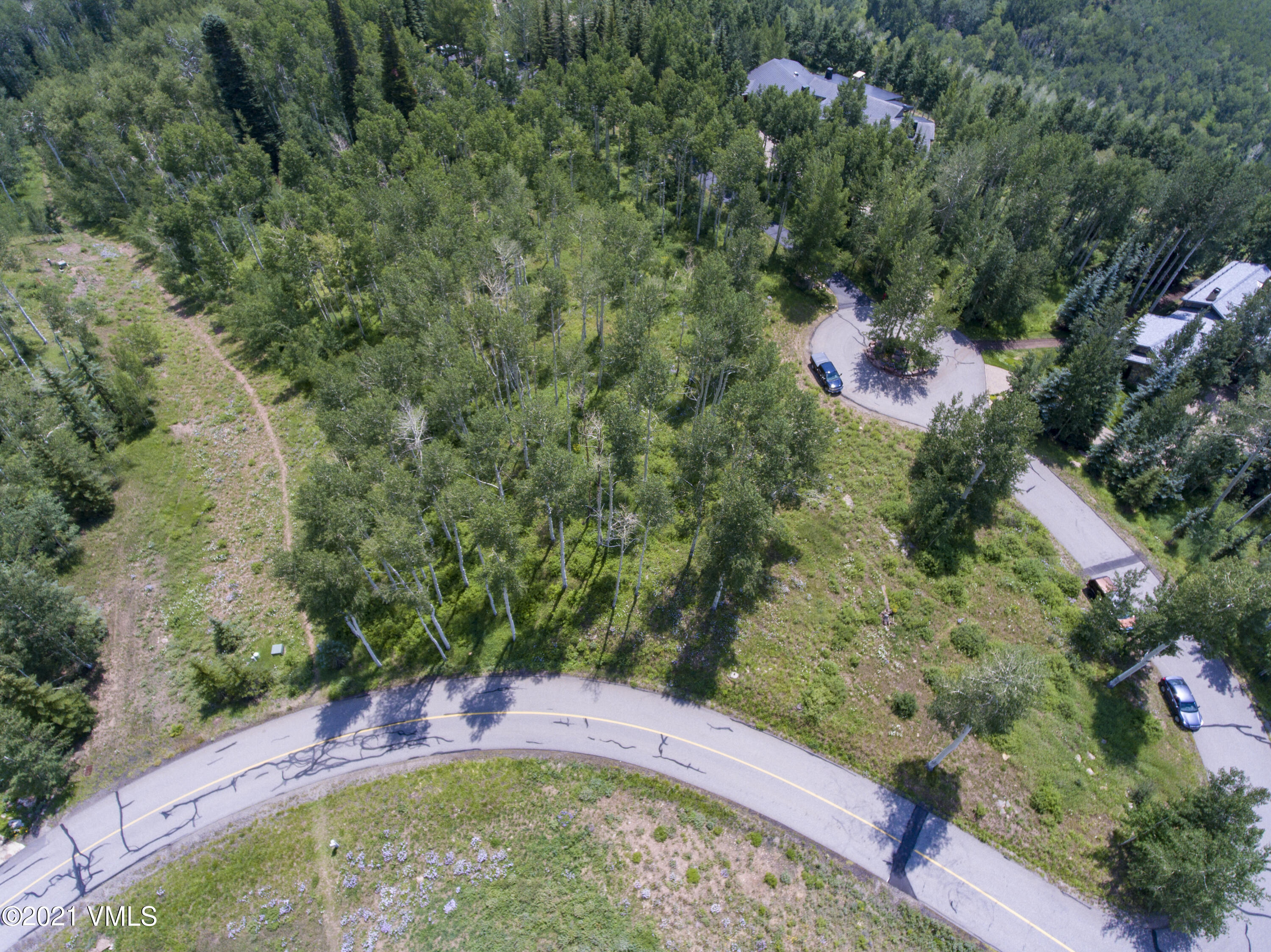 294 Shooting Star Avon, CO 81620 - Photo 5 of 23 an aerial view of residential house with outdoor space and trees all around