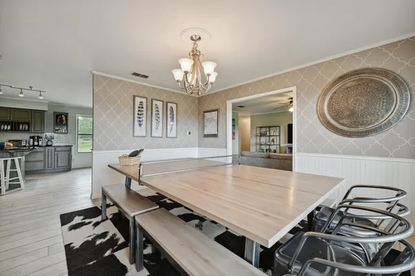 a room with furniture and a chandelier