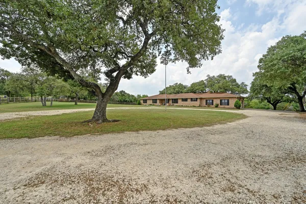 a view of a park with tree s