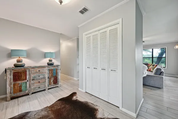 a bed room with furniture and a window