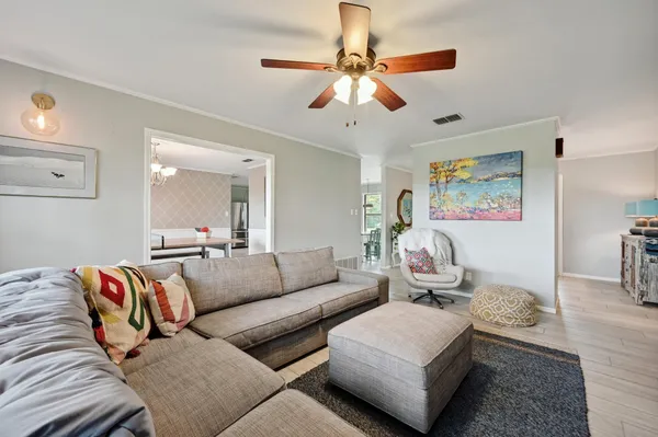 a living room with furniture and a couch