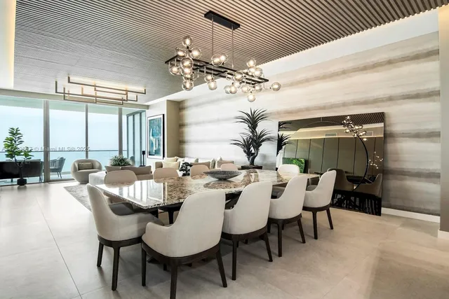 a kitchen with a sink and refrigerator