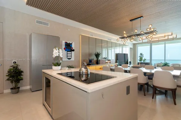 a bedroom with a large bed and a couch