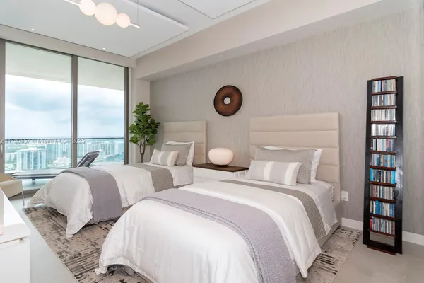 a bathroom with a toilet and shower