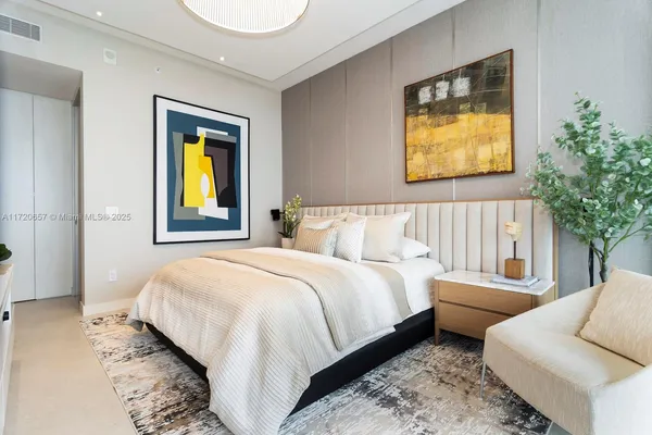 a view of a hallway with storage and utility room