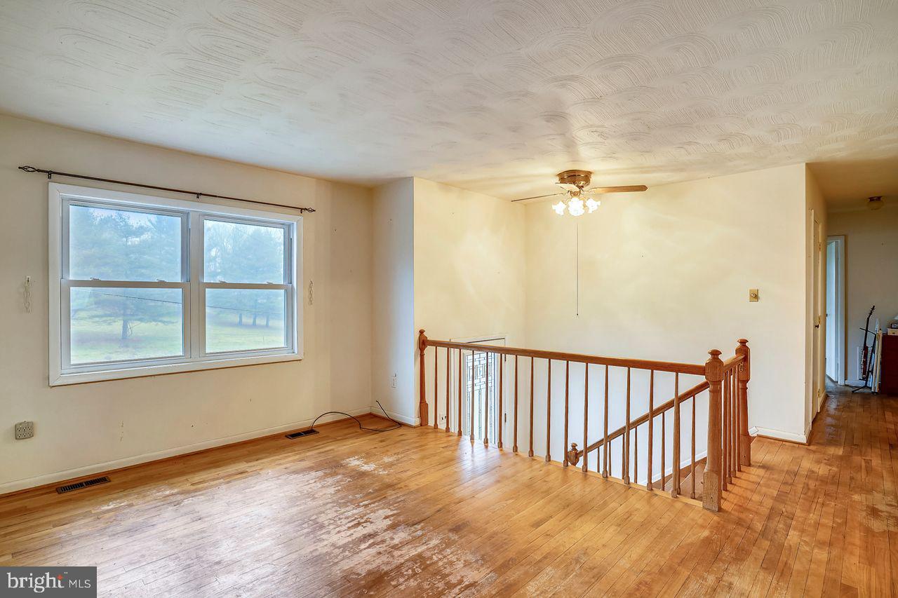 1112 Bloom Road Westminster, MD 21157 - Photo 13 of 47 Livingroom with hardwood flooring