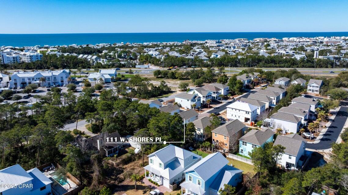 111 West Shore Place Inlet Beach, FL 32461 - Photo 17 of 45 an aerial view of a city with lots of residential buildings ocean and mountain view in back