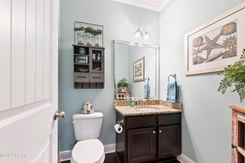 111 West Shore Place Inlet Beach, FL 32461 - Photo 30 of 45 a bathroom with a toilet a sink and mirror