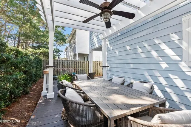 a view of backyard with outdoor seating a patio and a garden