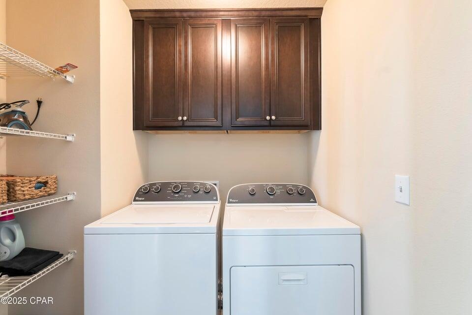 111 West Shore Place Inlet Beach, FL 32461 - Photo 33 of 45 a utility room with dryer and washer