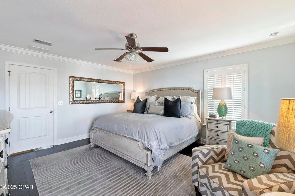 111 West Shore Place Inlet Beach, FL 32461 - Photo 36 of 45 a bedroom with a bed and a mirror