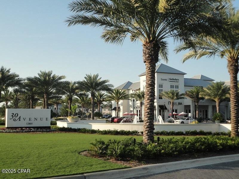 111 West Shore Place Inlet Beach, FL 32461 - Photo 39 of 45 a front view of multi story residential apartment building with yard and green space