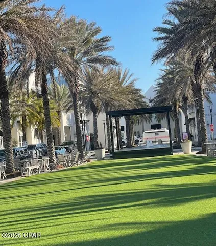 a view of a swimming pool with a patio