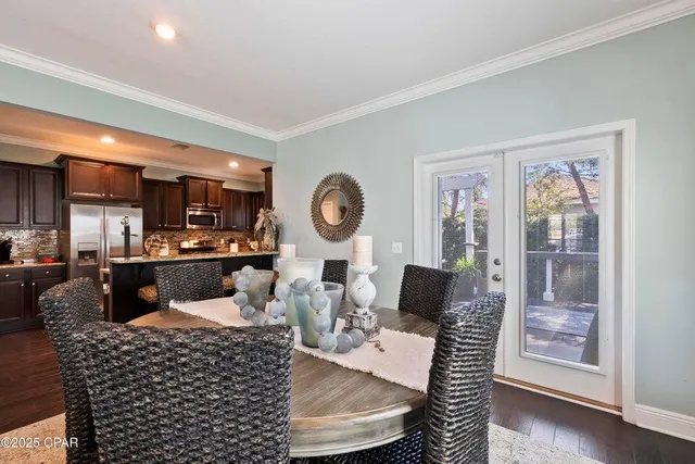 a living room with furniture a rug and a window