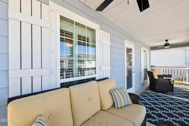 a bedroom with furniture and a window
