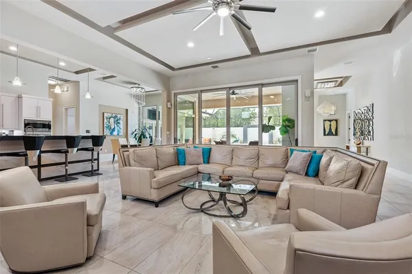 a spacious bathroom with a double vanity sink and a mirror