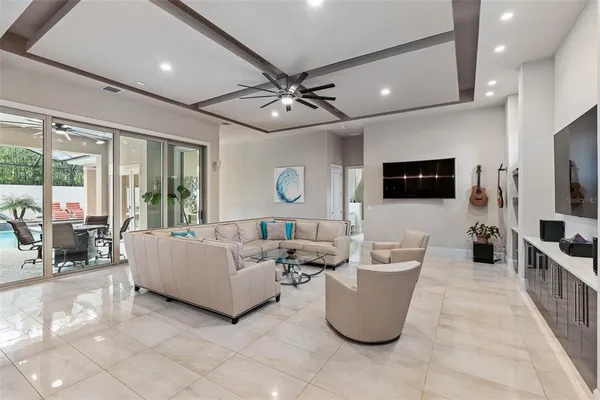 a bathroom with a sink vanity and a large mirror