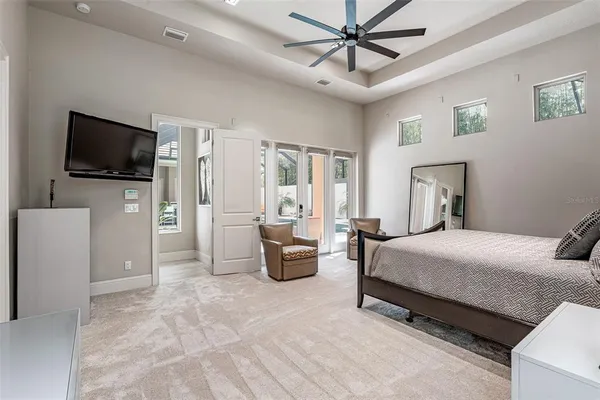 a view of a livingroom with furniture and a flat screen tv
