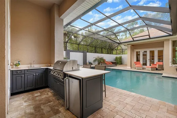 a front view of a house with a yard and a garage